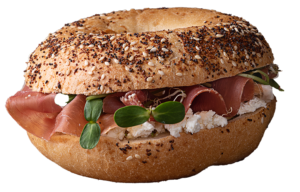 Bagel with lox, onions, and herbs.