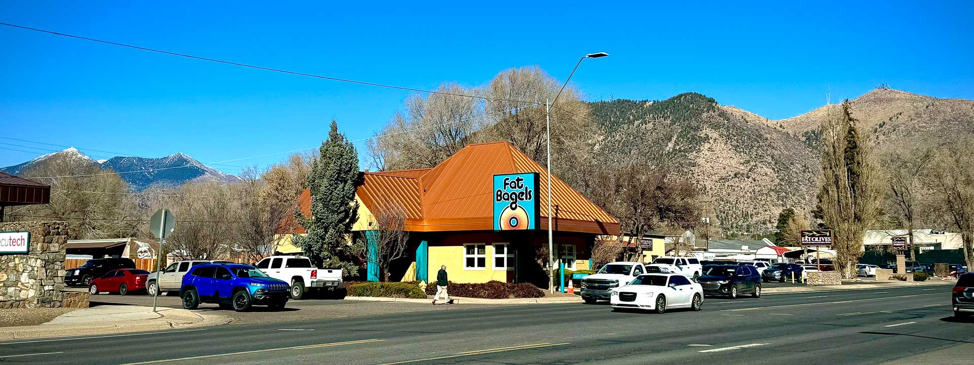 The Fat Bagels location, between Fat Olives and Salsa Brava. See our copper roof and turquoise sign.